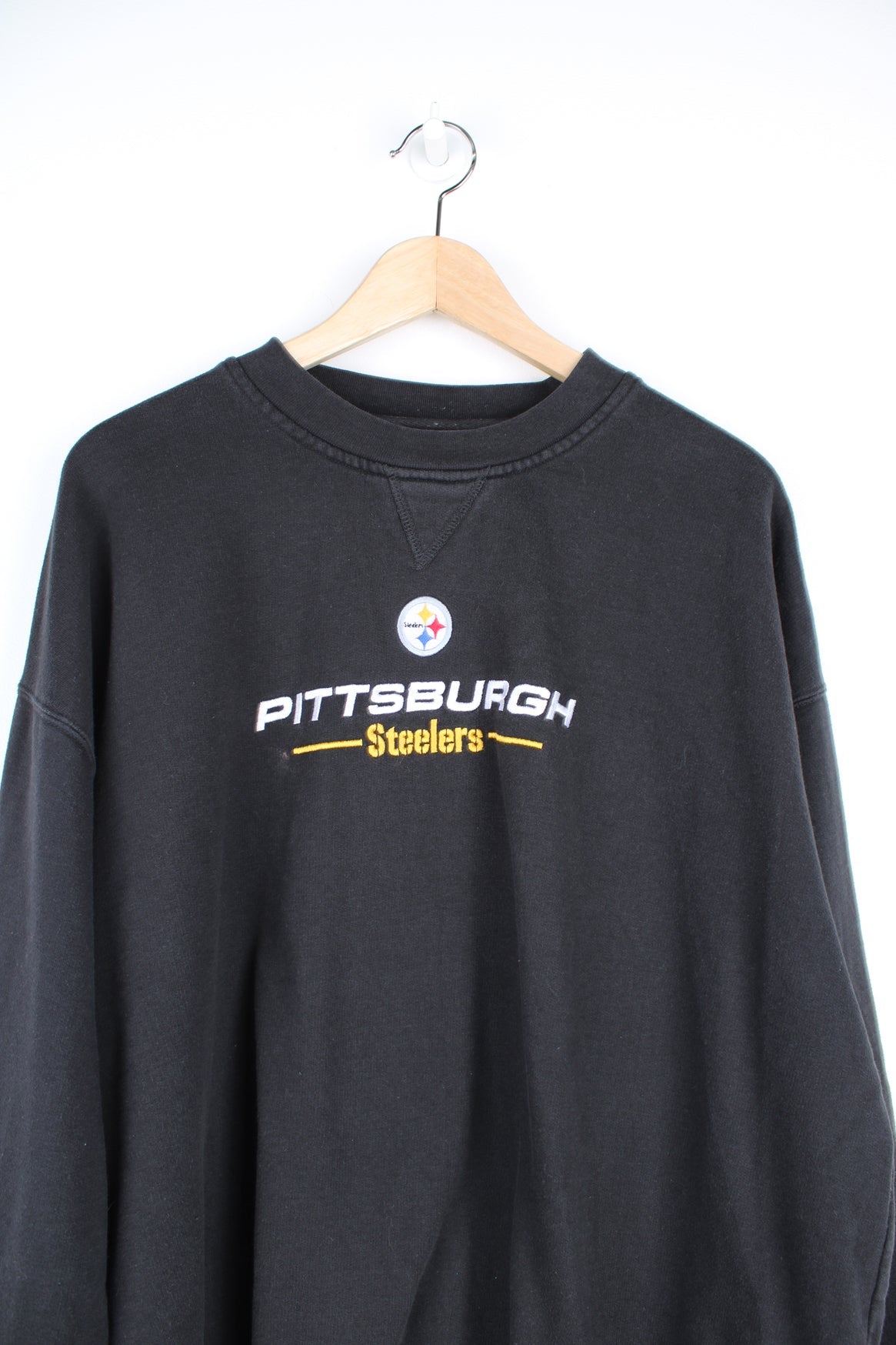 Pittsburgh Steelers sweatshirt with embroidered logo across the chest.