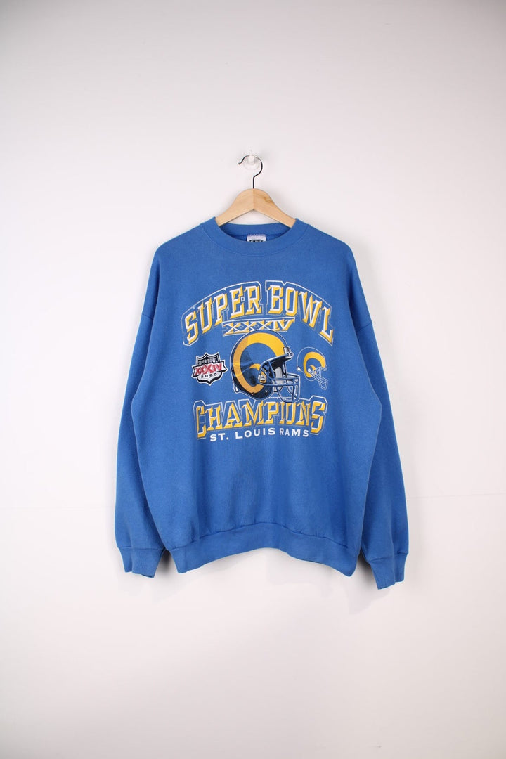 Vintage 2000 St. Louis Rams NFL Super Bowl Champions Sweatshirt in a blue colourway with the team logo and spell out printed on the front.