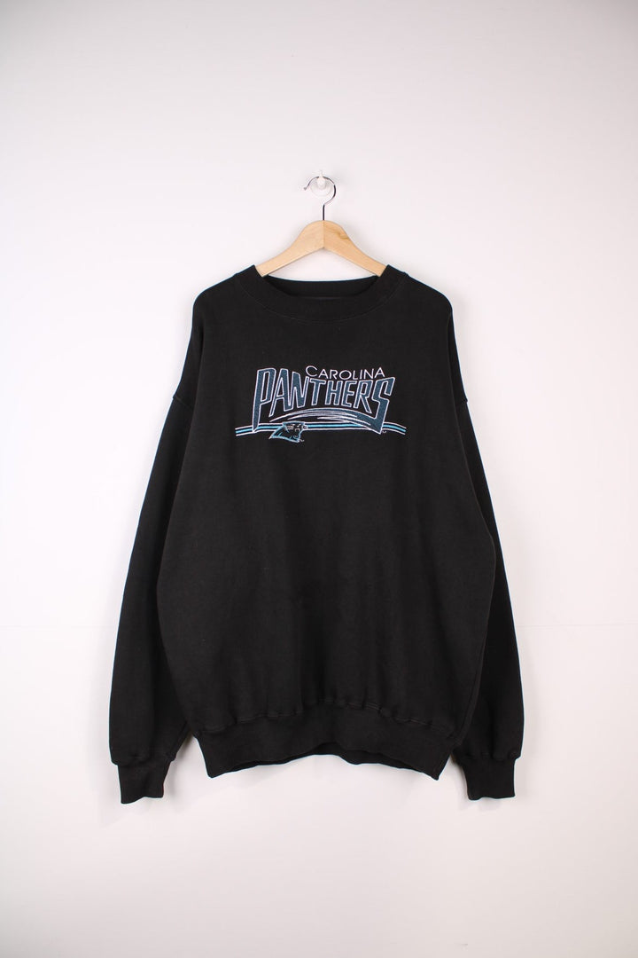 Carolina Panthers NFL Sweatshirt in a black colourway with the team logo and spell out embroidered across the front.