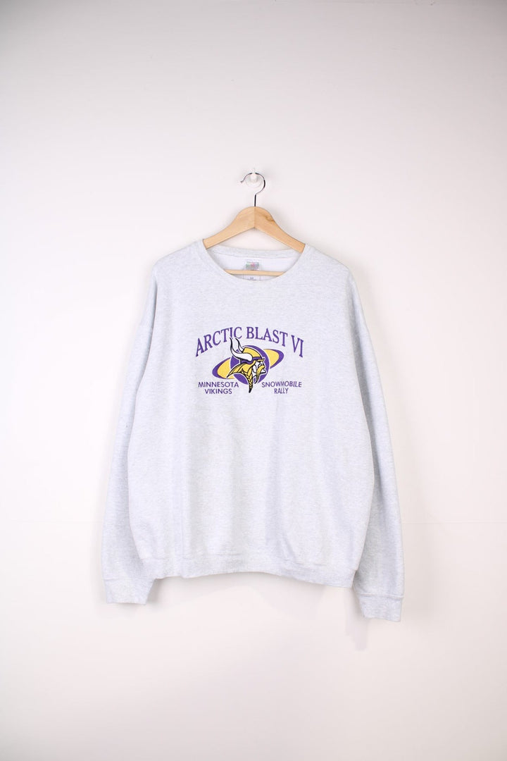 Vintage Minnesota Vikings Arctic Blast Sweatshirt in a grey colourway with the logo and spell out embroidered across the front.