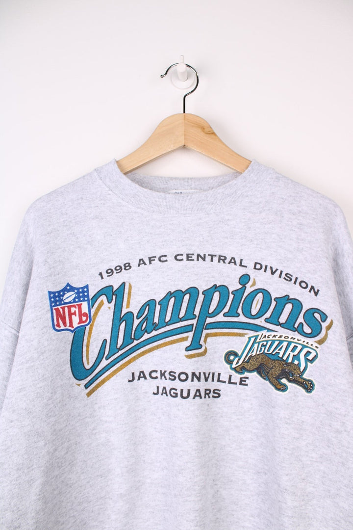 1998 Jacksonville Jaguars  Central Division Champions Sweatshirt in a  colourway with the team logo and spell out printed on the front.