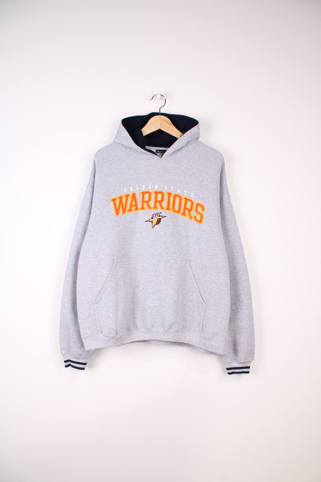 Golden State Warriors NBA Hoodie in a grey colourway with the team logo and spell out embroidered across the front.