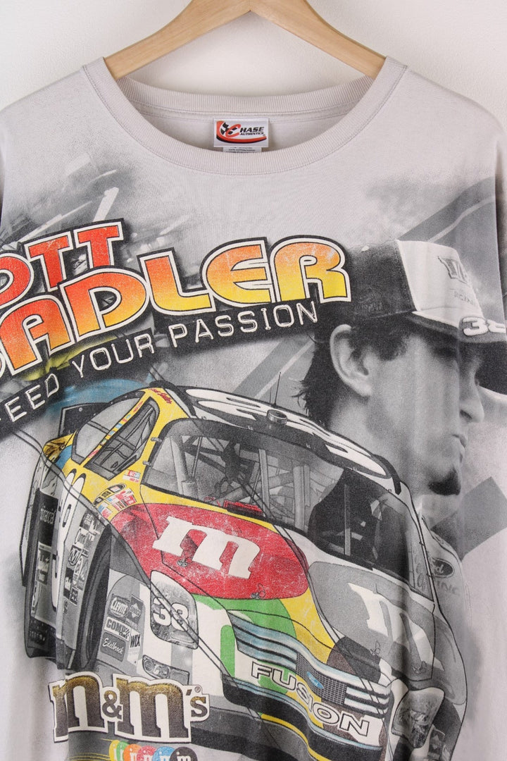 Elliot Sadler Chase  Racing T-Shirt in a  colourway with his name, car and racing number printed on the front in a big graphic.