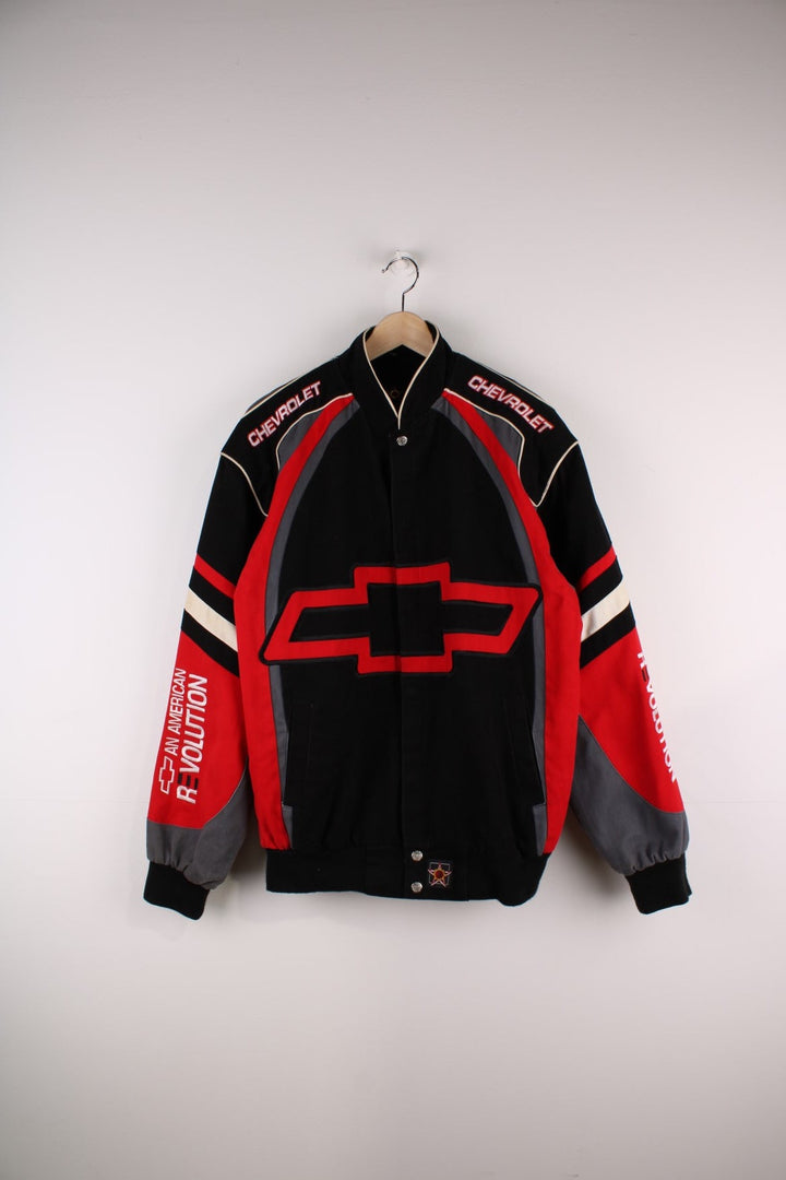 Vintage Chevrolet Nascar Racing Jacket in a black and red colourway, buttons ups, has side pockets and the logo embroidered on the front and back.