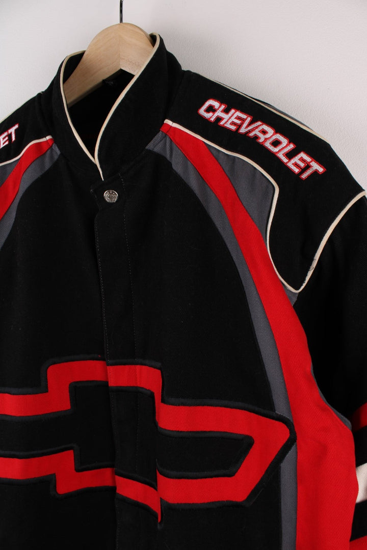 Vintage Chevrolet  Racing Jacket in a  and red colourway, buttons ups, has side pockets and the logo embroidered on the front and back.