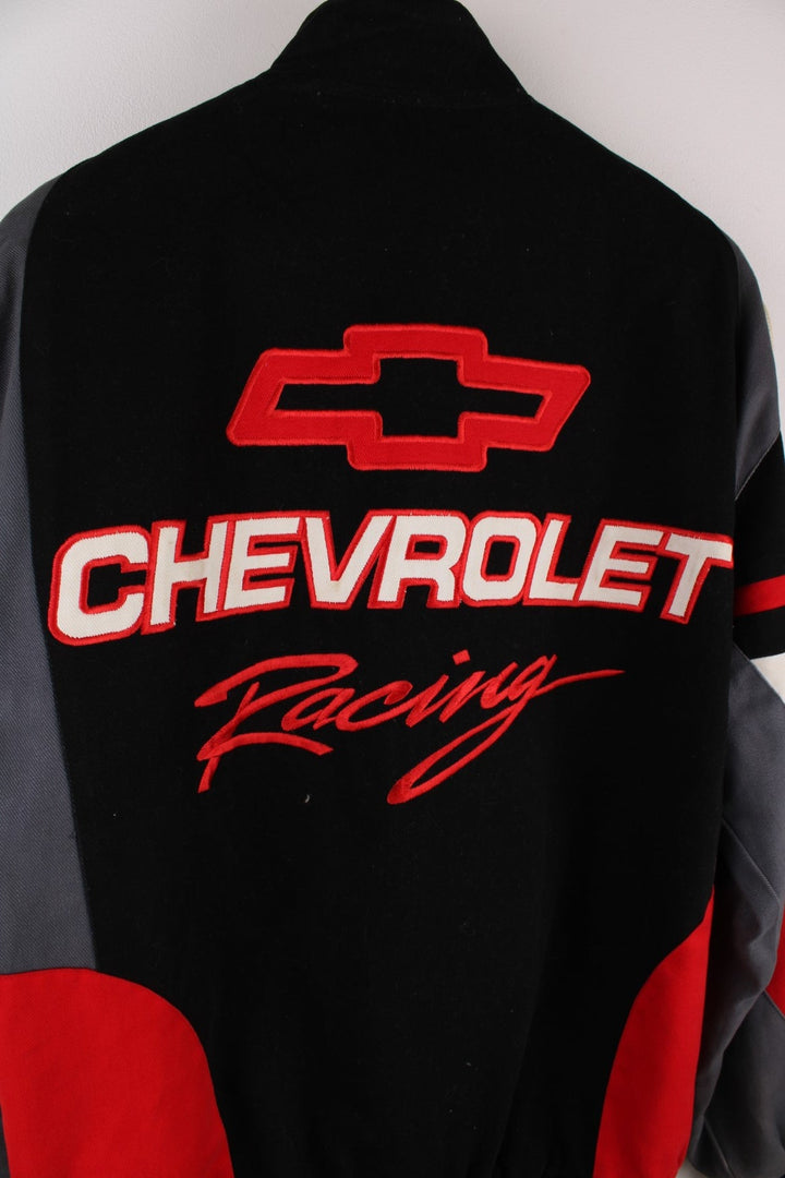 Vintage Chevrolet  Racing Jacket in a  and red colourway, buttons ups, has side pockets and the logo embroidered on the front and back.