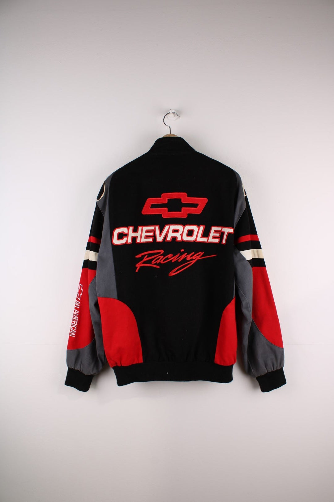 Vintage Chevrolet  Racing Jacket in a  and red colourway, buttons ups, has side pockets and the logo embroidered on the front and back.