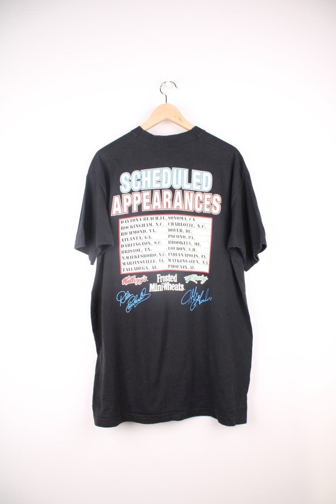 Vintage 1995 Dale Earnhardt and Jeff Gordon, The Kid and The Champ single stitch T-Shirt. Features large graphic print on the front and back.