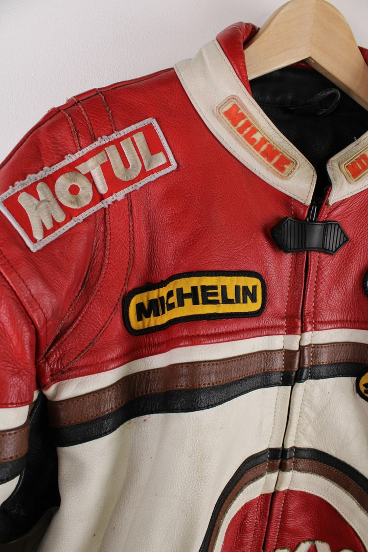 Vintage Lucky Strike  Racing Jacket in a  and red colourway, zips up with side pockets, and has logo embroidered all over the jacket and the back is signed.