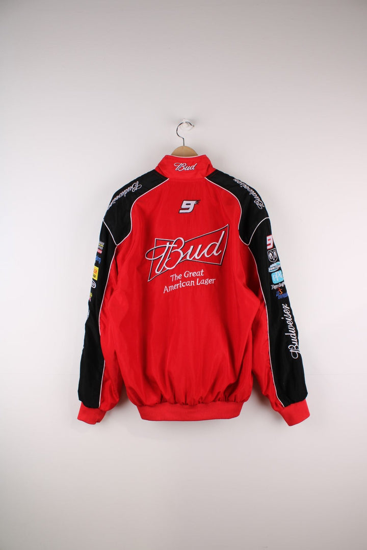 Vintage Budweiser  Racing Jacket in a  and black colourway, zip up closure, has side pockets, and the spell out logos embroidered on all over the jacket. 