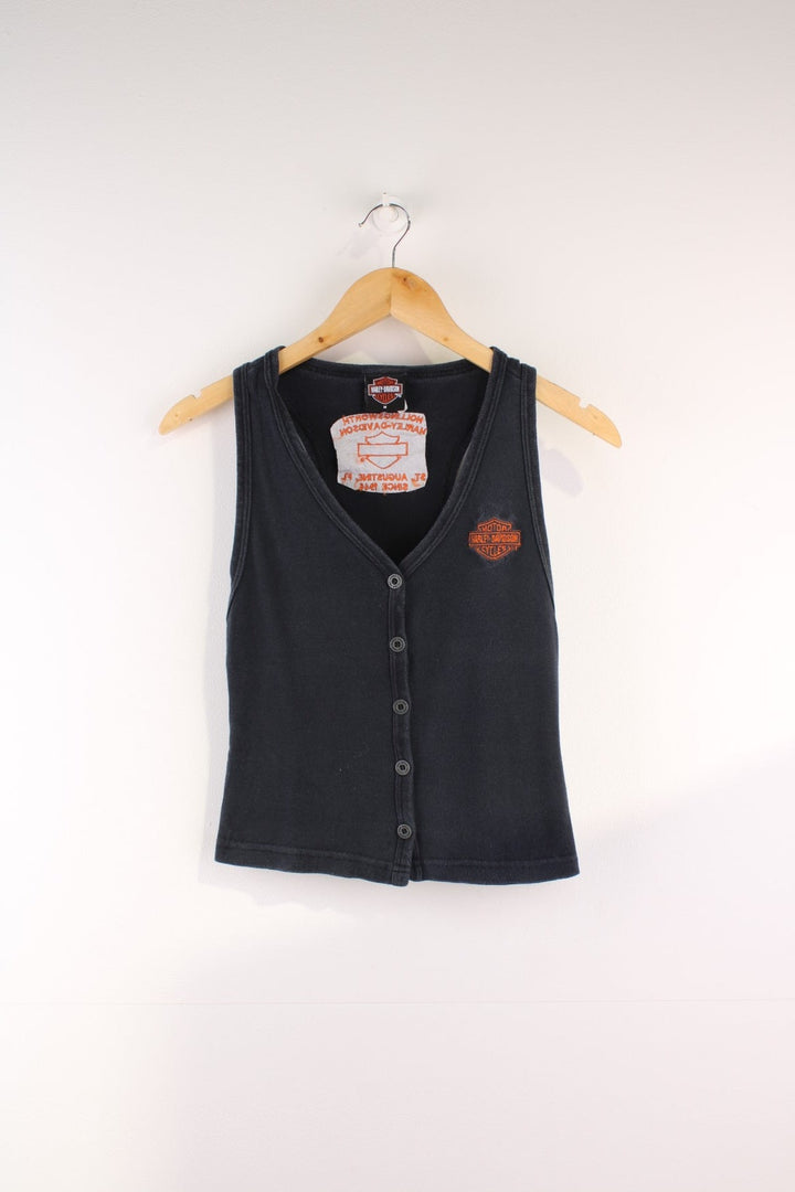 Harley-Davidson Y2K Vest Top in a black colourway, buttons up and has a v neck collar, and the logo embroidered on the front and back.