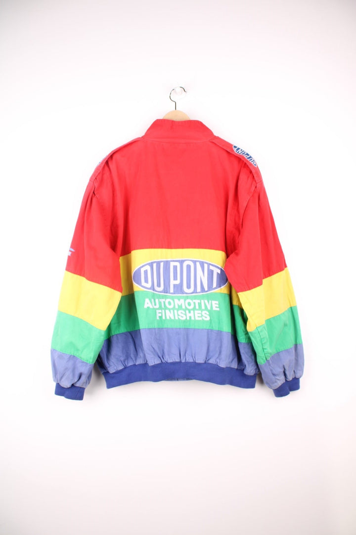 Vintage Jeff Gordon Du Pont, NASCAR bomber jacket in red, yellow, green and blue. Features embroidered logo and badge.