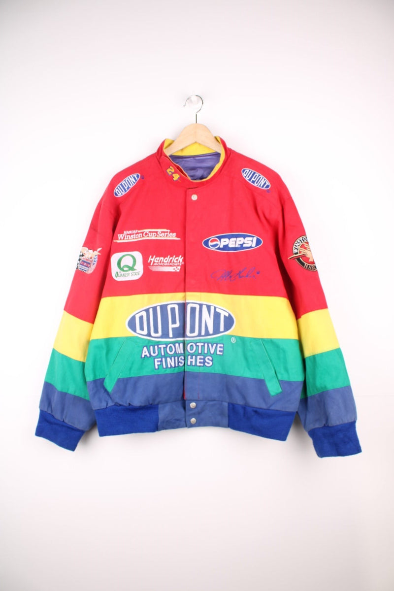 Vintage Jeff Gordon Du Pont, NASCAR bomber jacket in red, yellow, green and blue. Features embroidered badges.