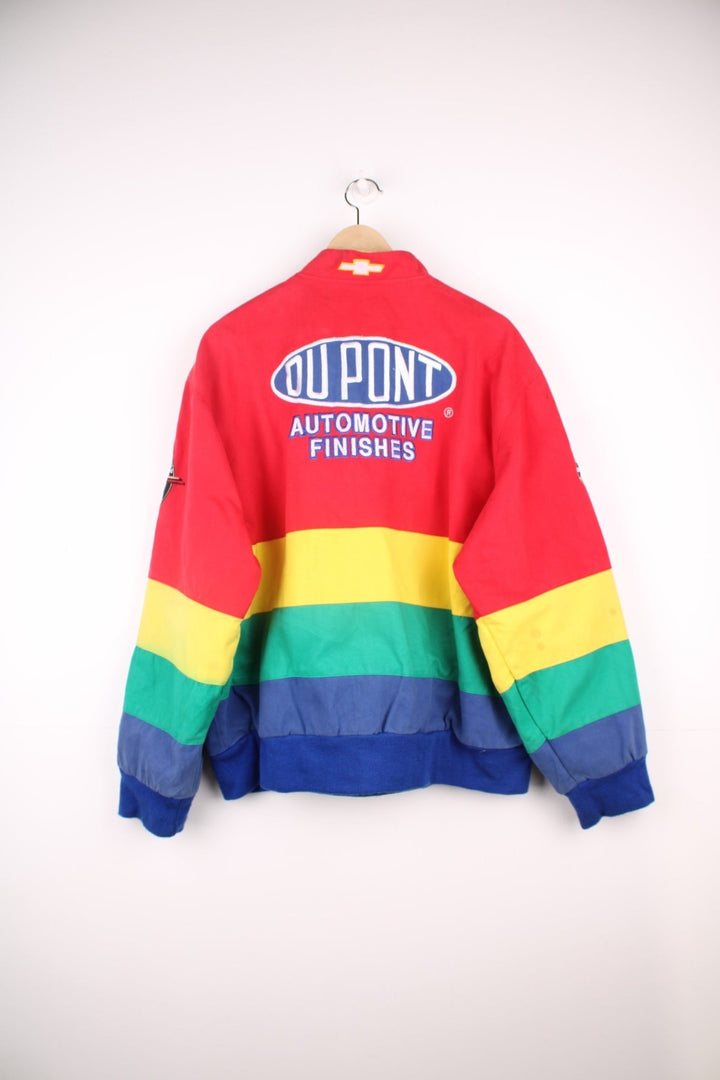 Vintage Jeff Gordon Du Pont, NASCAR bomber jacket in red, yellow, green and blue. Features embroidered badges.