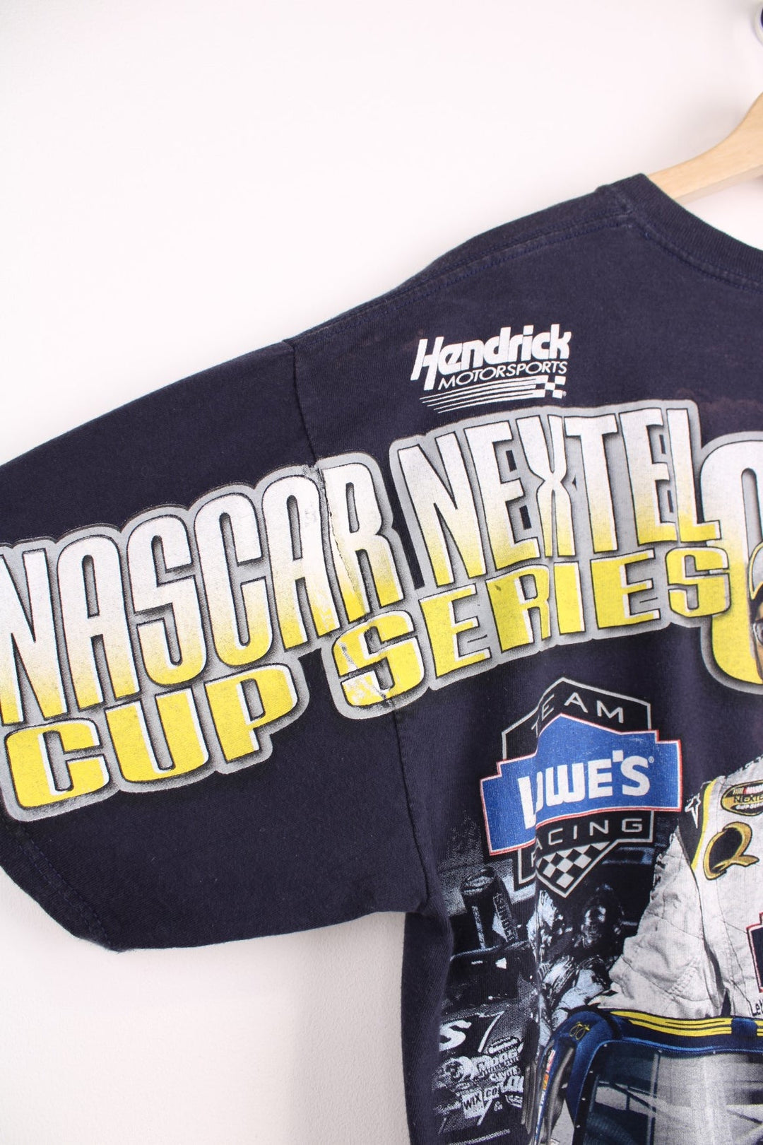 Jimmie Johnson 2007, 2 Time Nextel Cup Champion T-Shirt with all over blue and yellow graphic print. 