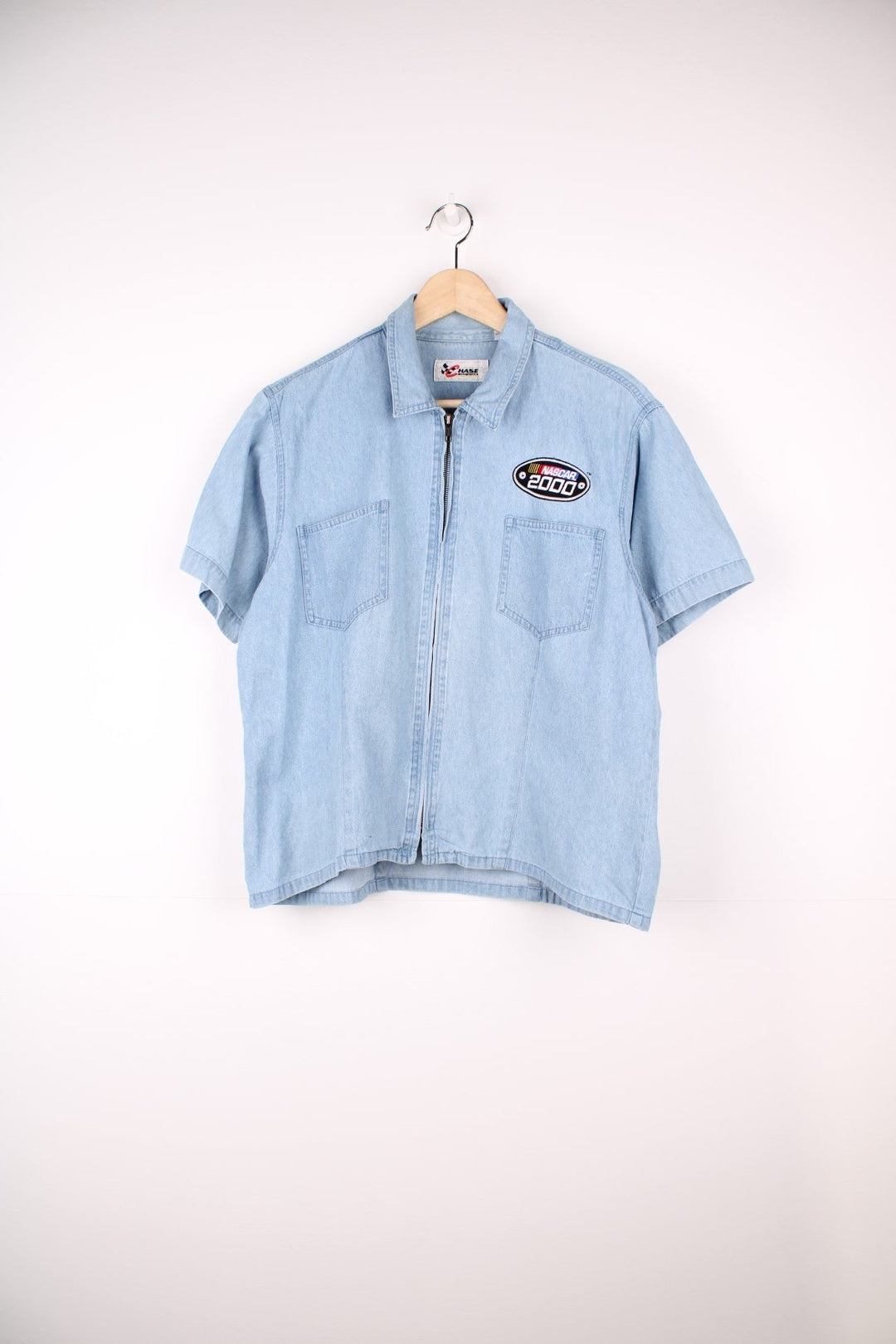 Nascar zip through denim shirt with pockets and embroidered badge on the chest.