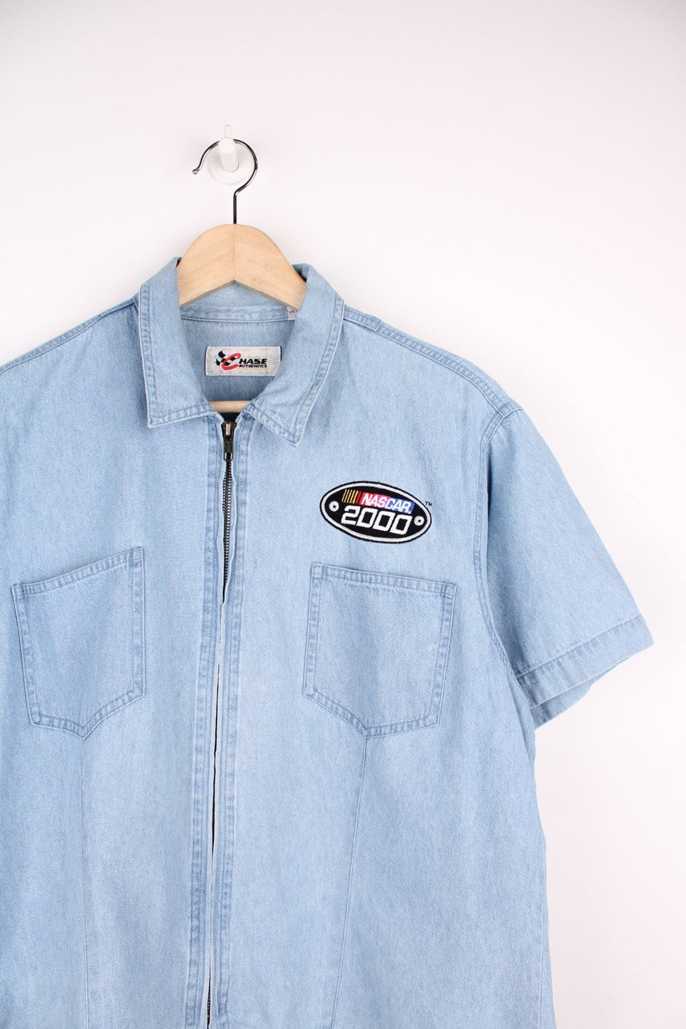 Nascar zip through denim shirt with pockets and embroidered badge on the chest.