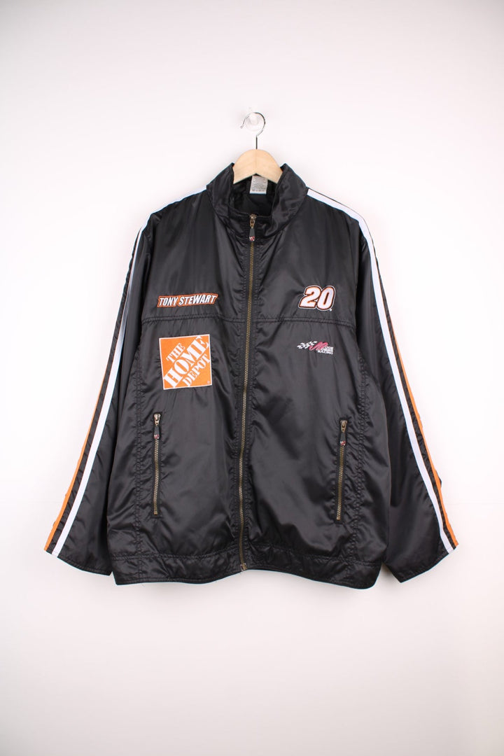 NASCAR Tony Stewart zip through jacket in black and orange with embroidered badges.