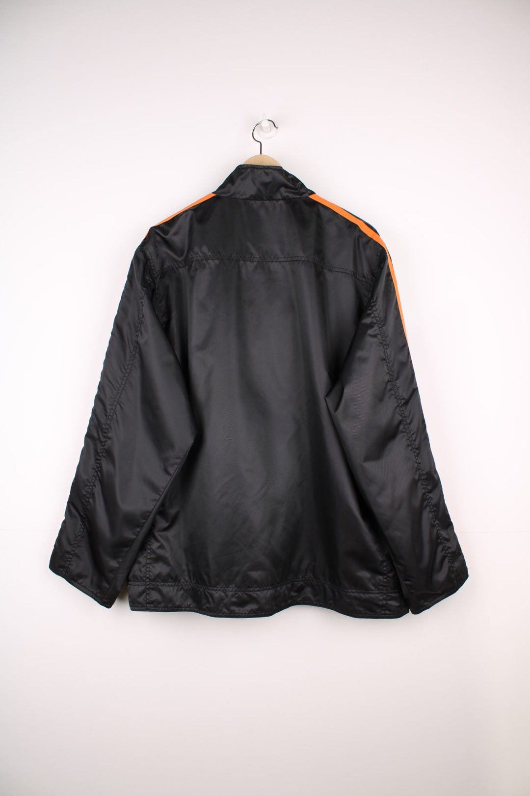 NASCAR Tony Stewart zip through jacket in black and orange with embroidered badges.