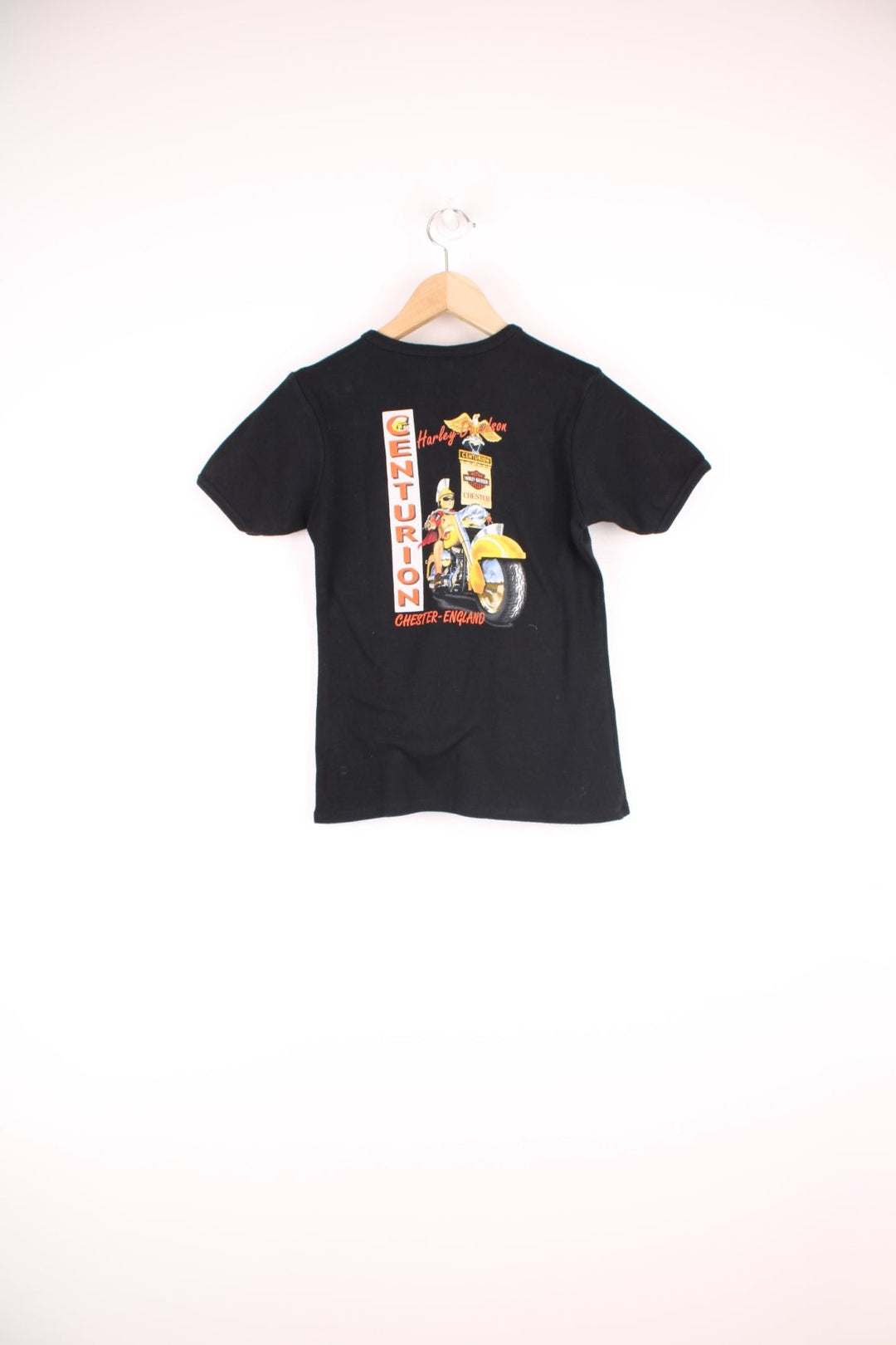 Y2K Harley Davidson Baby Tee in a black colourway, Chester England, and has eagles and roses printed on the front, and on the back a centurion biker. 