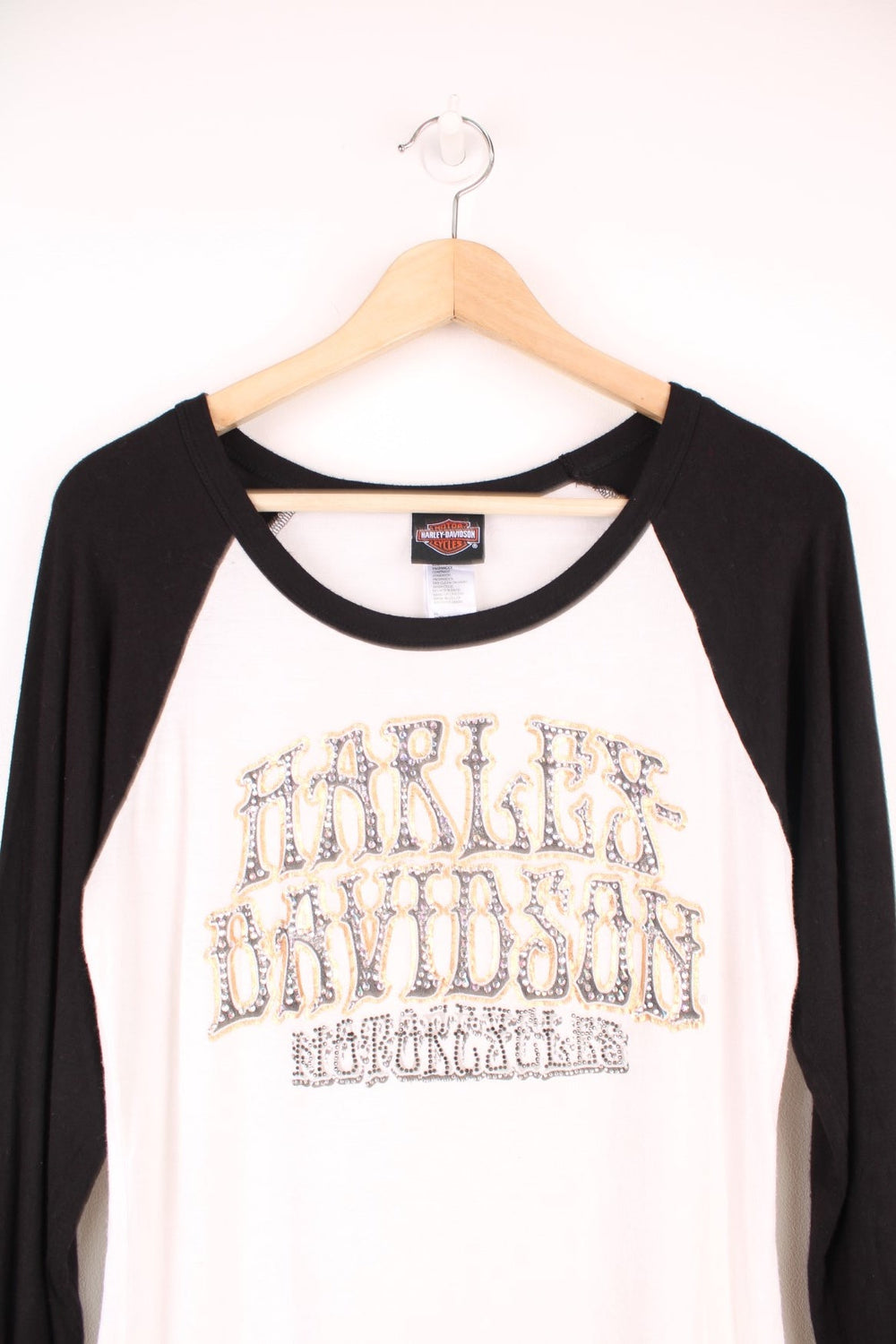 Y2K Harley Davidson Long Sleeved Top in a black and white colourway with the spell out printed on the front and covered in studs.