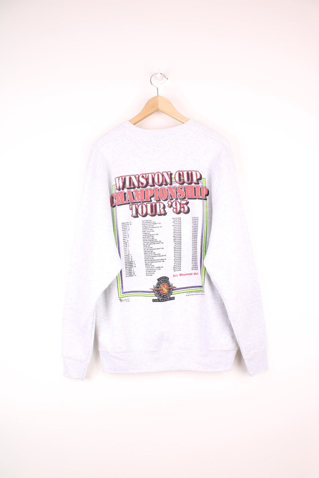 1996 Nascar Winston Cup Championship Sweatshirt in a grey colourway, has the championship spell out and car printed on the front, as well as all the tour dates on the back.