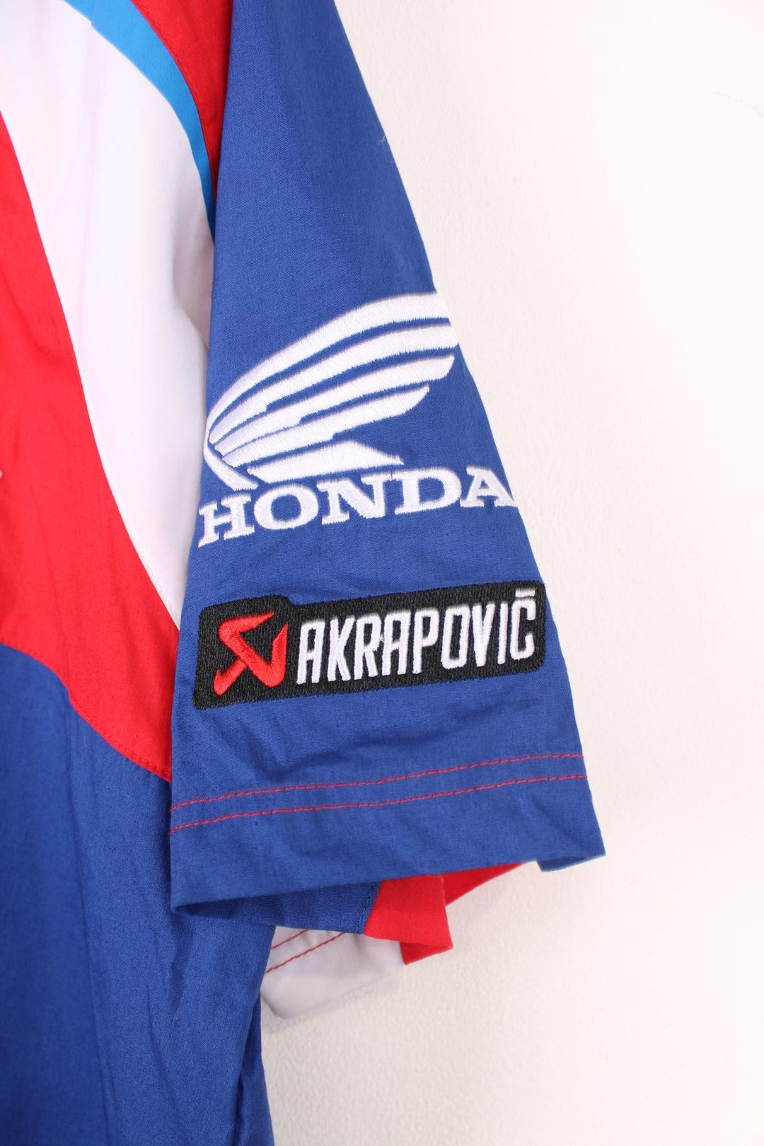 Honda Racing Shirt in a red, blue and white colourway, new with tags still on, button up shirt with the brand logos embroidered all over. 