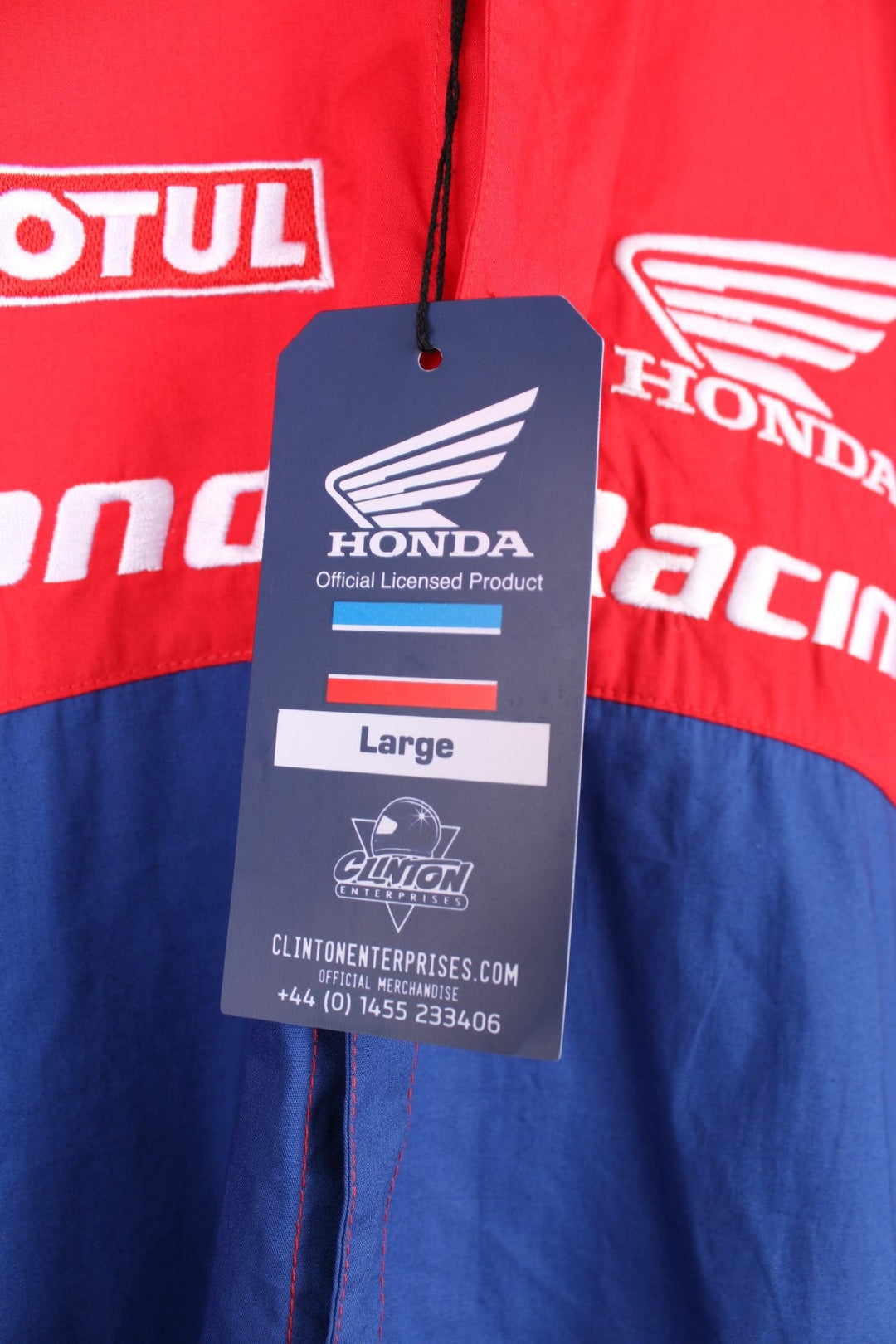 Honda Racing Shirt in a red, blue and white colourway, new with tags still on, button up shirt with the brand logos embroidered all over. 