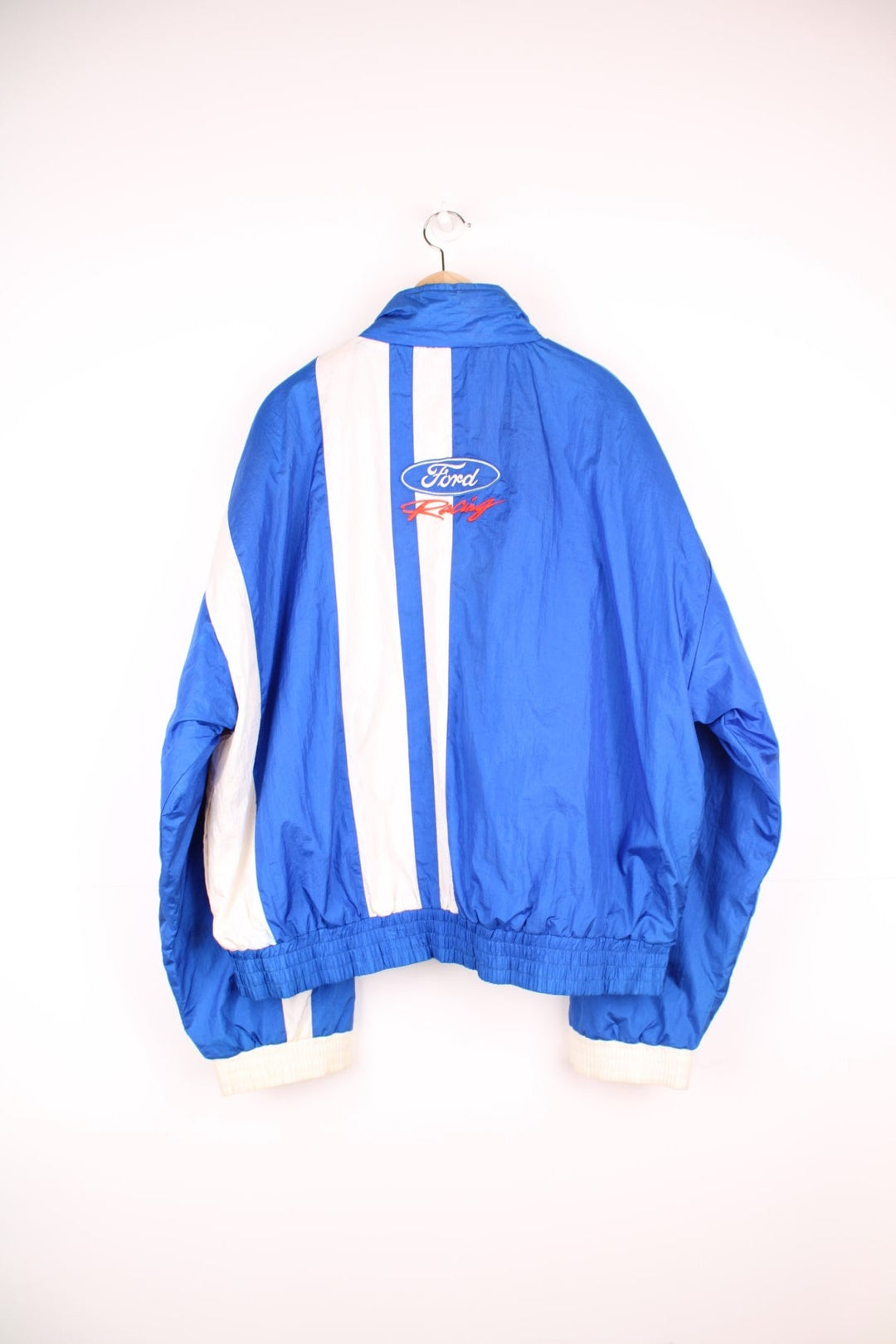 Ford Racing Jacket in a blue and white colourway, zip up with side pockets, insulated with a quilted lining and has the logo embroidered on the front and back. 