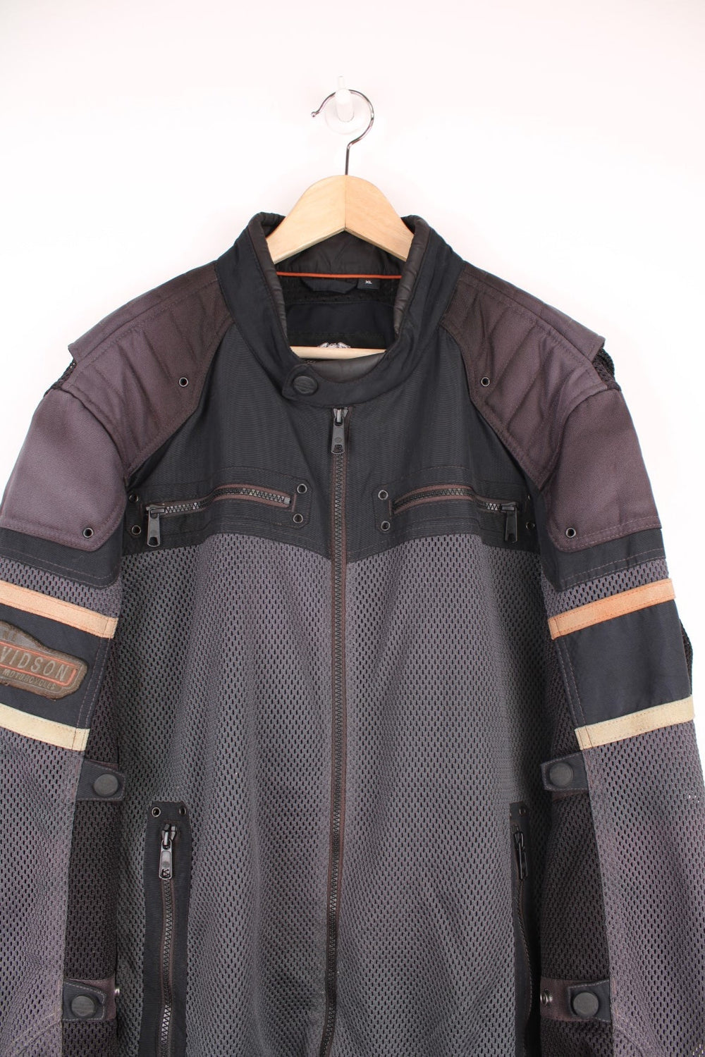 Harley Davidson zip through motorcycle jacket in grey and black, features multiple pockets, and embroidered badges