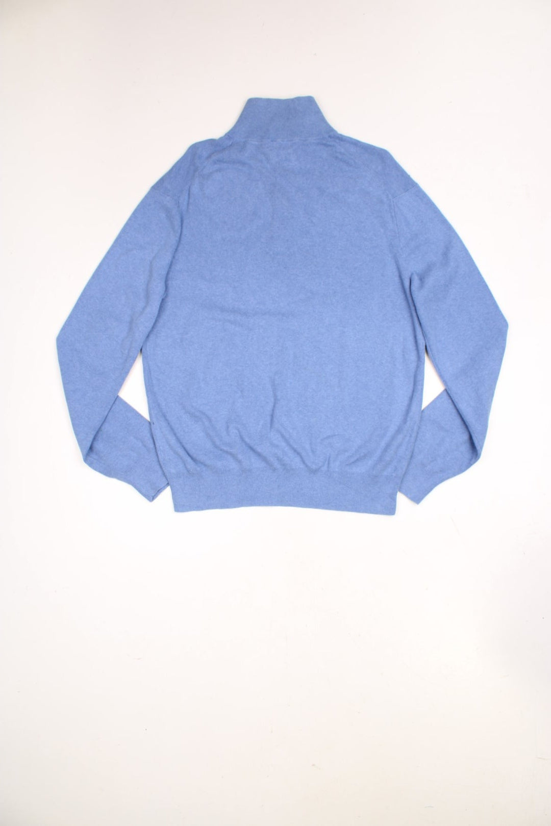 Polo Ralph Lauren 1/4 zip sweatshirt in a blue colourway with the logo embroidered on the chest in yellow.