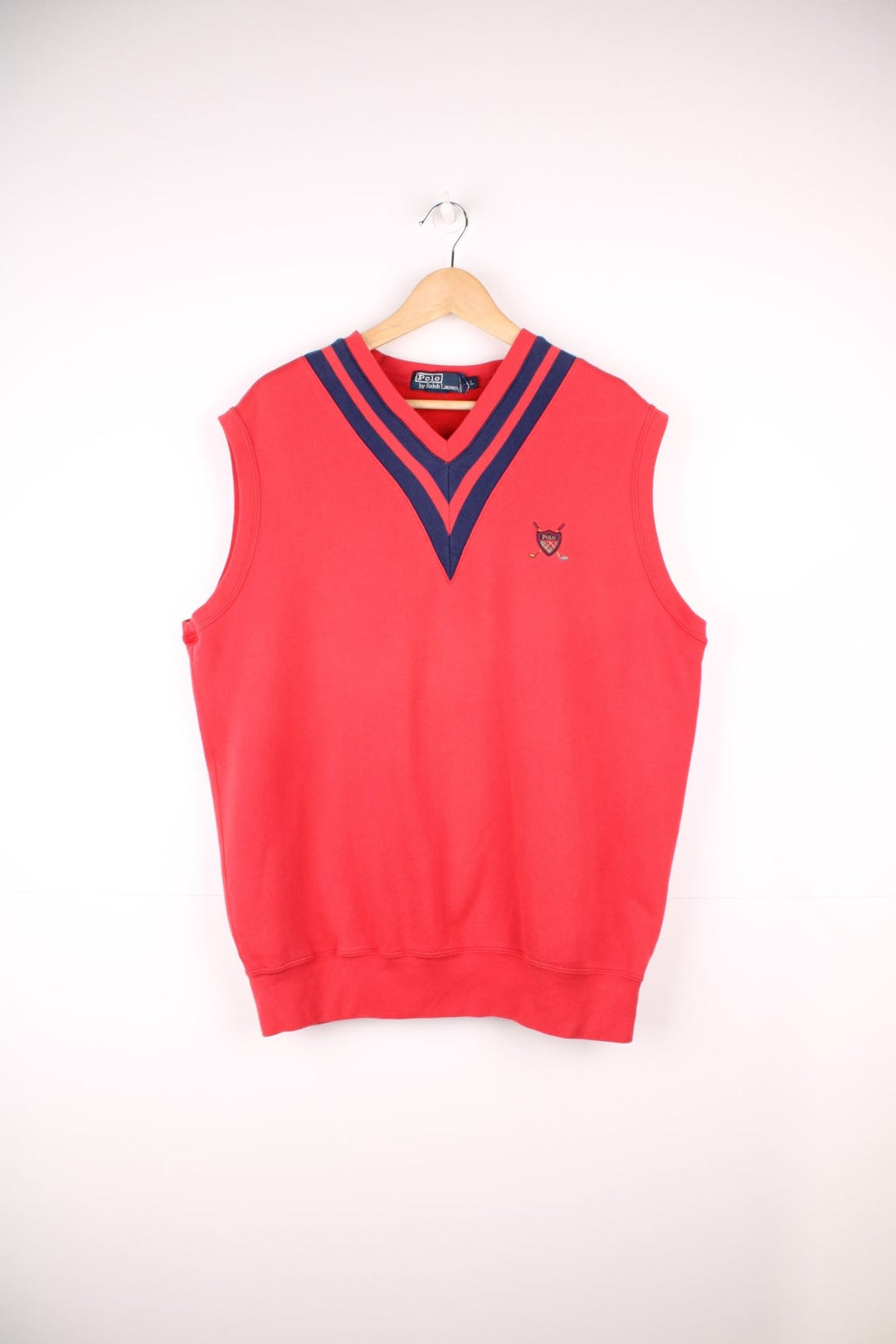 Vintage Polo Ralph Lauren sweater vest in red with navy blue detailing on the neck and embroidered logo on the chest.