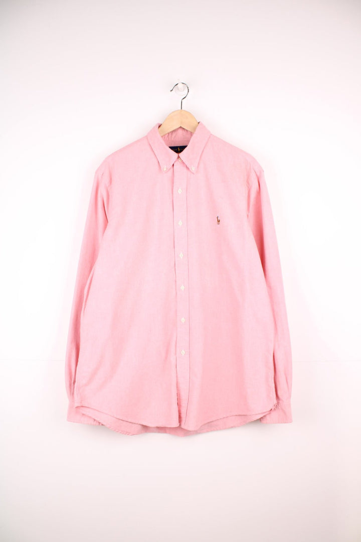 Pink Ralph Lauren button-down shirt with signature Polo logo embroidered in brown. 