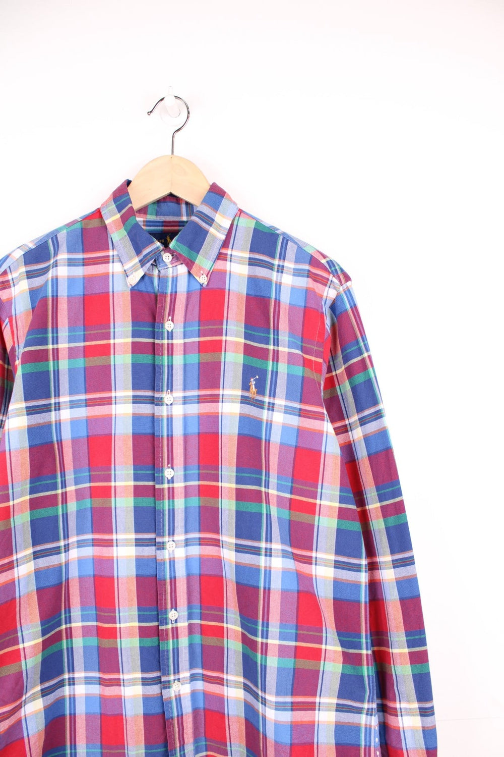 Red, blue, green, and white check Ralph Lauren button-down shirt with signature Polo logo embroidered in brown. 