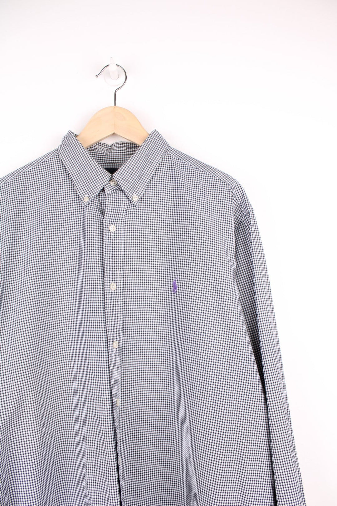 Black and white check Ralph Lauren button-down shirt with signature Polo logo embroidered in purple. 