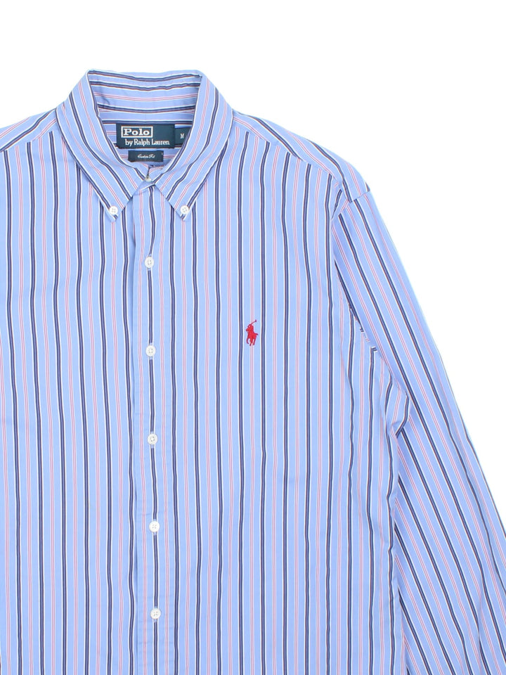 Ralph Lauren Shirt in a blue, red and white striped colourway, button up with the logo embroidered on the front.