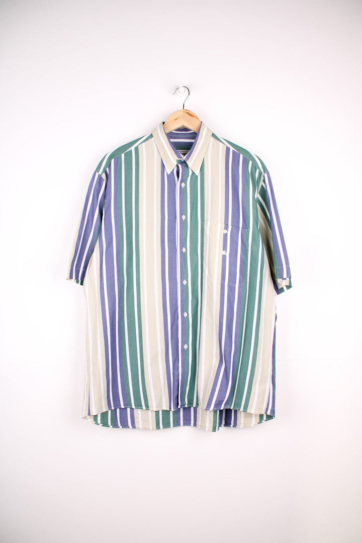 Burberry short-sleeved button-down shirt in blue, green, and tan stripes with vintage 'Burberrys of London' tag inside, button closure, one breast pocket and a small embroidered logo in white.