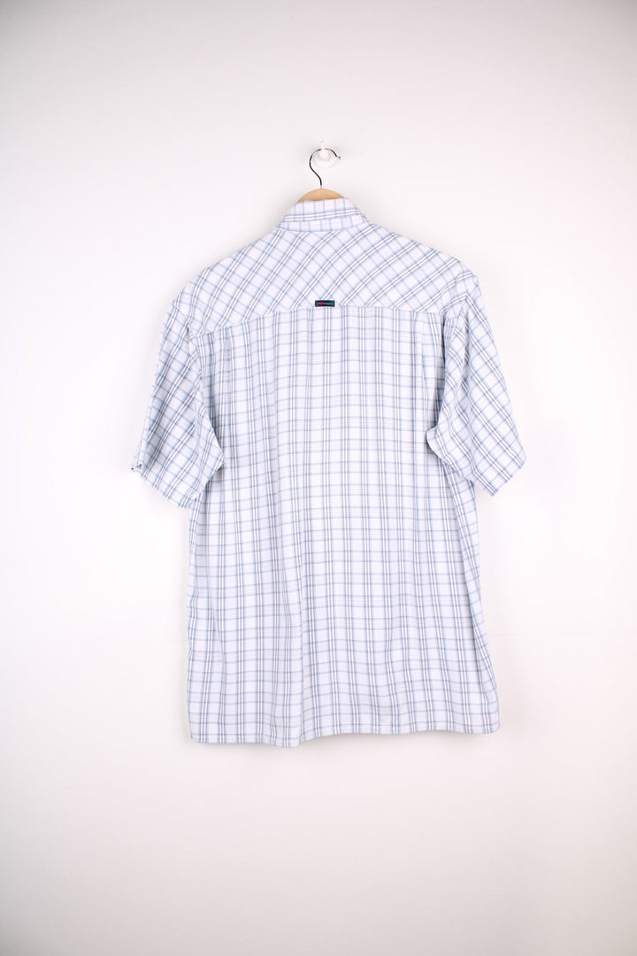 Kickers short-sleeved button-down shirt in blue and white check with button closure, one pocket and an embroidered logo on the chest.