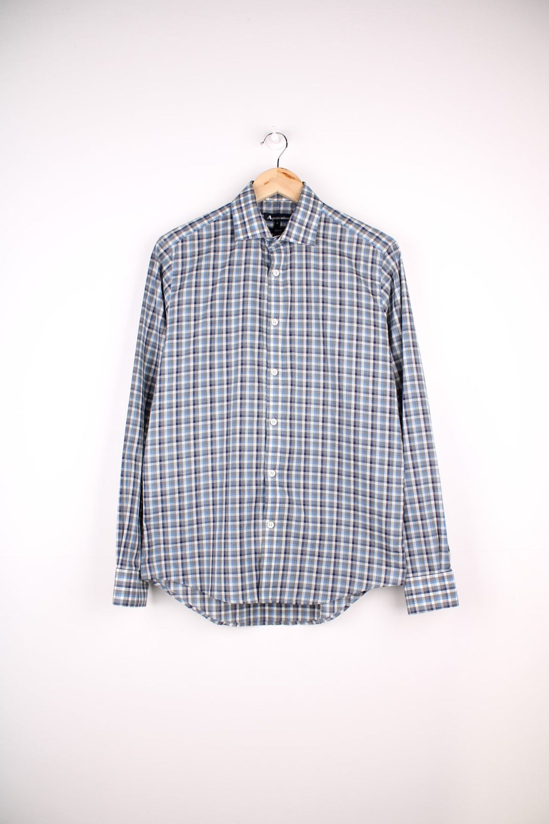 Aquascutum shirt in blue and grey check with button closure.