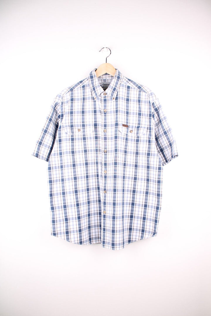 Carhartt short-sleeved shirt in Blue check with two pockets and button closure.