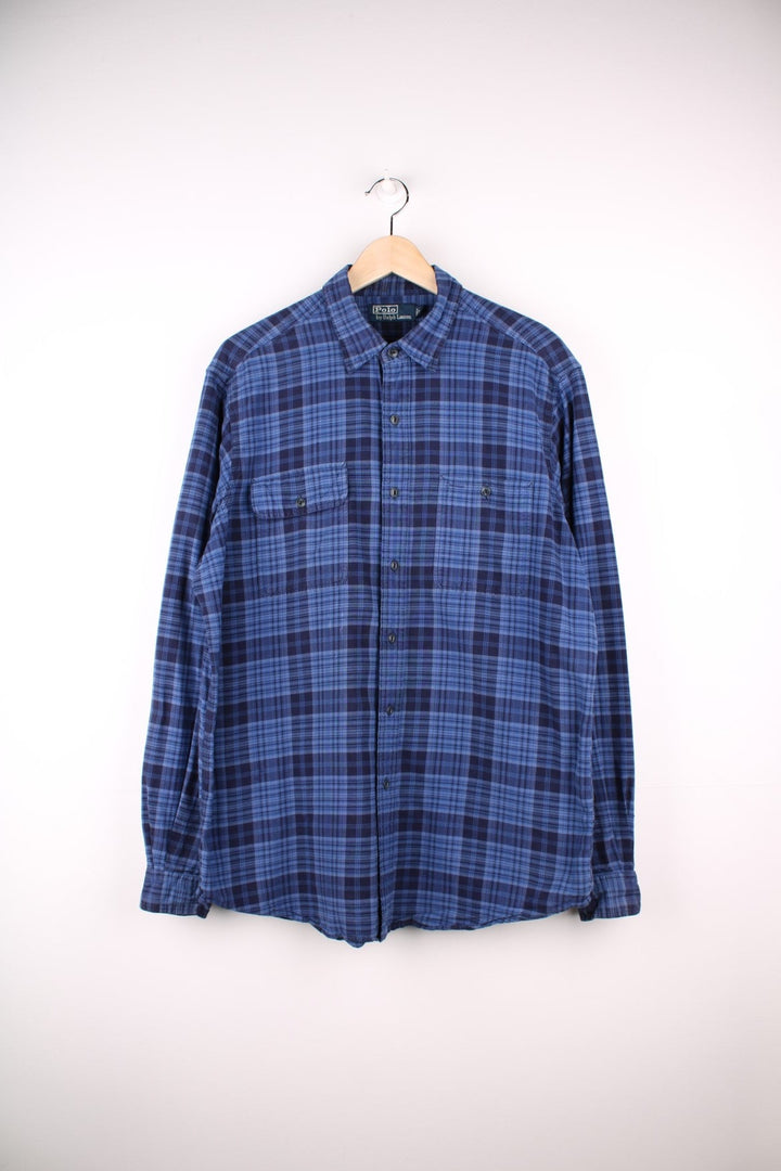 Ralph Lauren shirt in Blue check with two pockets and button closure.