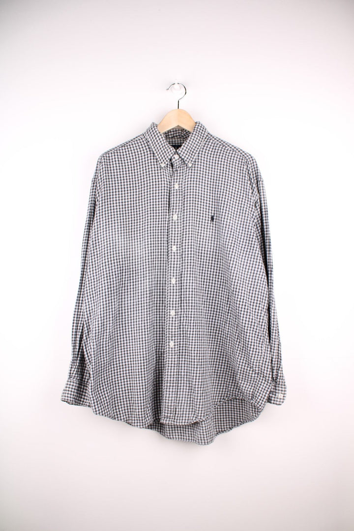 Ralph Lauren shirt in Grey check with two pockets and button closure.