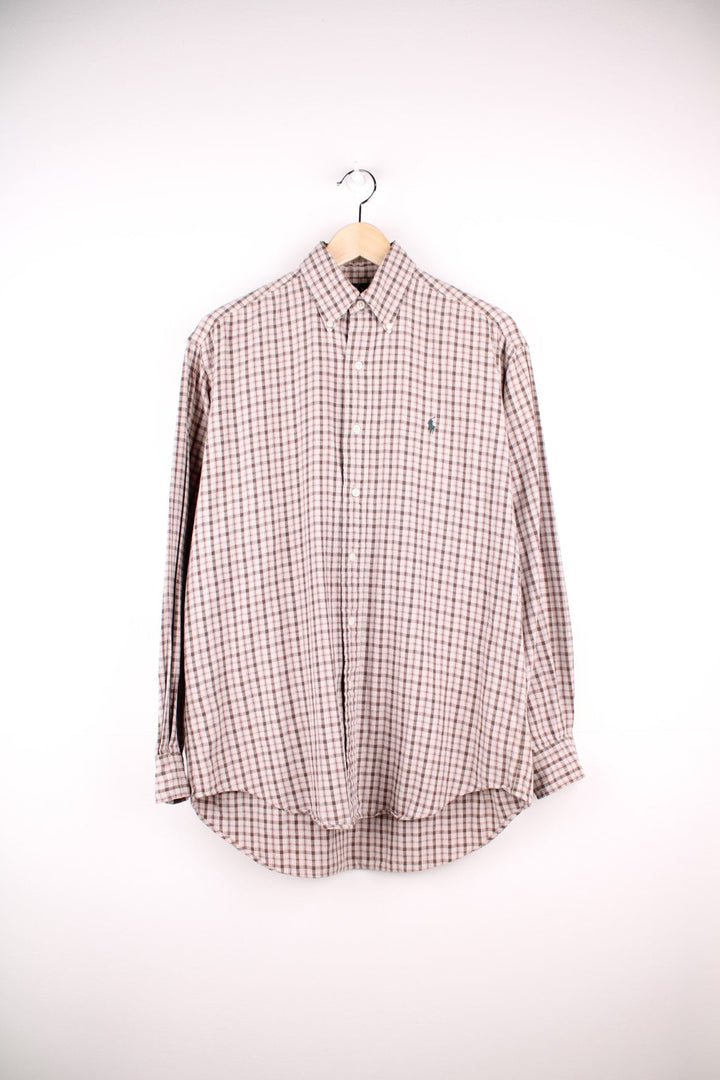 Ralph Lauren shirt in Tan check with button closure.