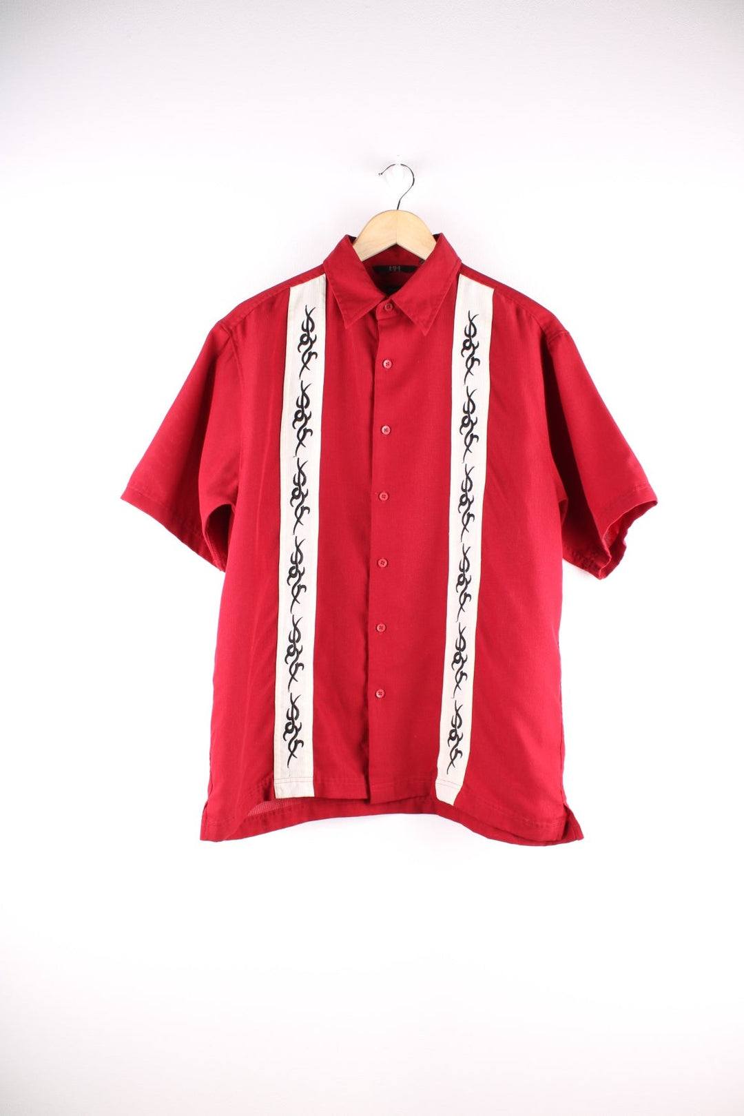 Y2K Tribal short-sleeved shirt by H&H in red with white stripes and black tribal designs.