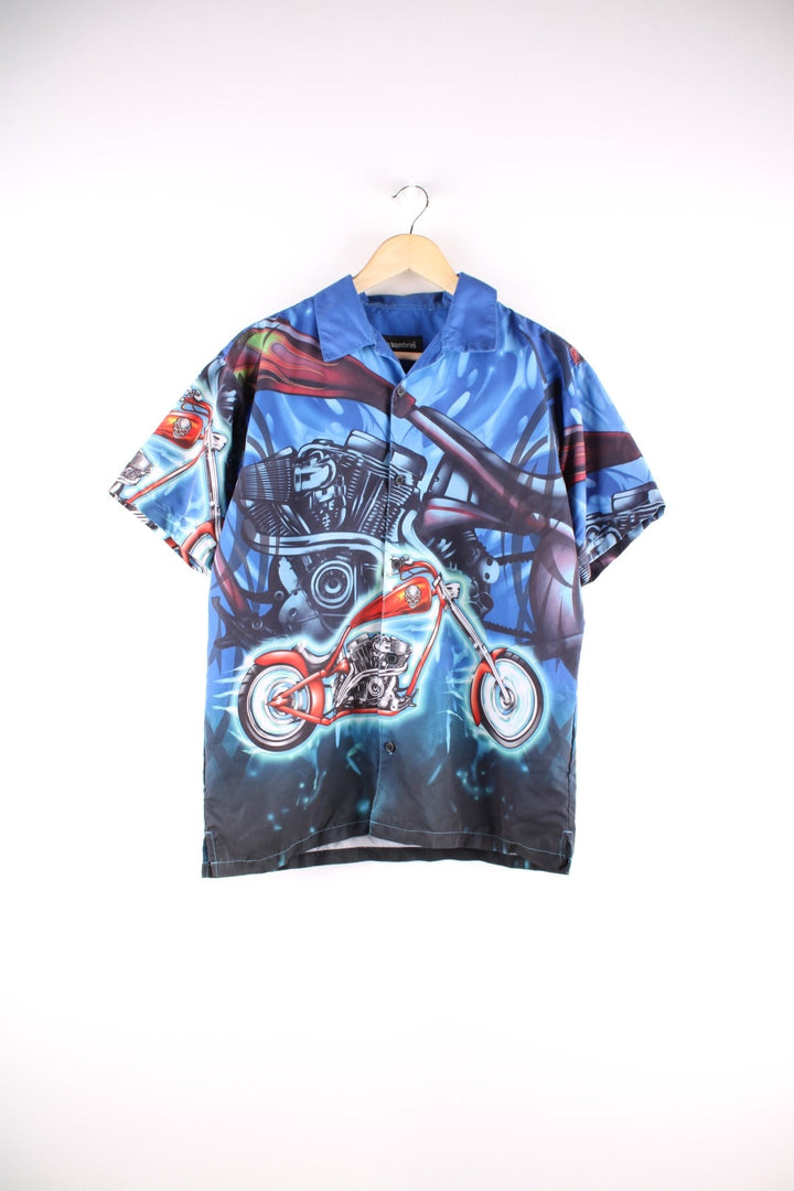 Y2K Racing short-sleeved shirt in blue with large cartoonish motorbike print and button closure.