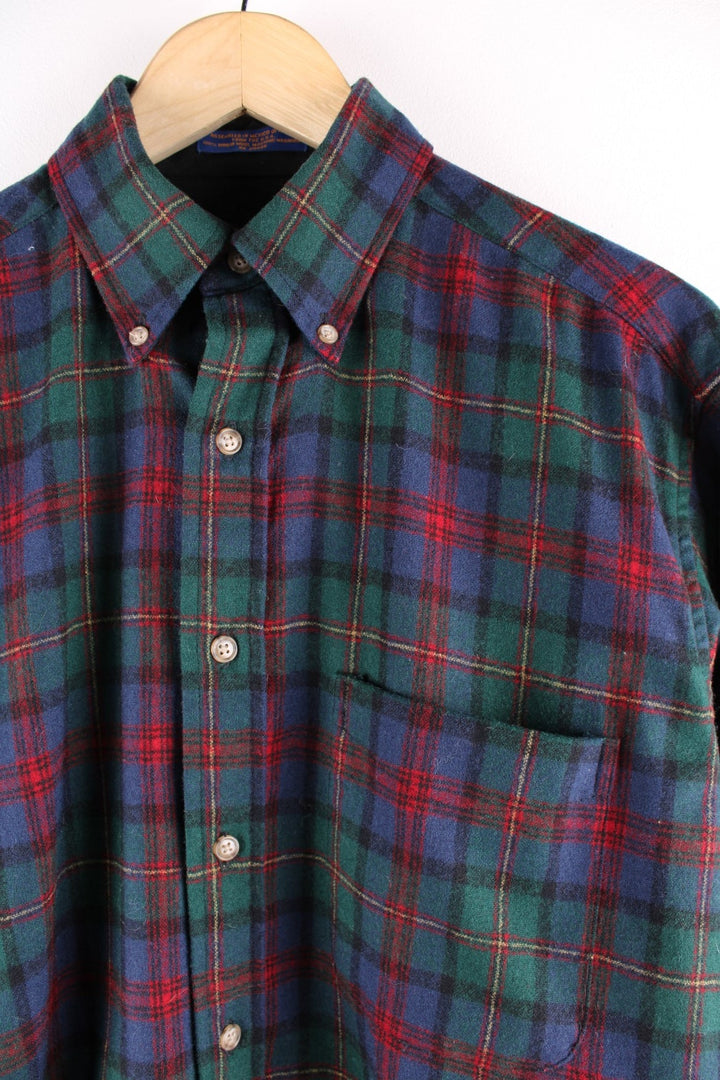 Pendleton 100% virgin wool button-down shirt in blue, green and red check, with one breast pocket.