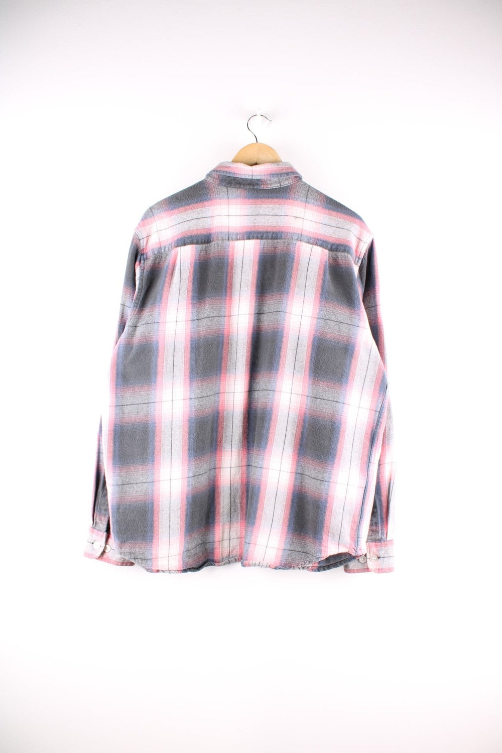 Vintage check shirt in pink, grey and white, with two buttoned pockets and a small O.B.E.Y. logo patch in black..