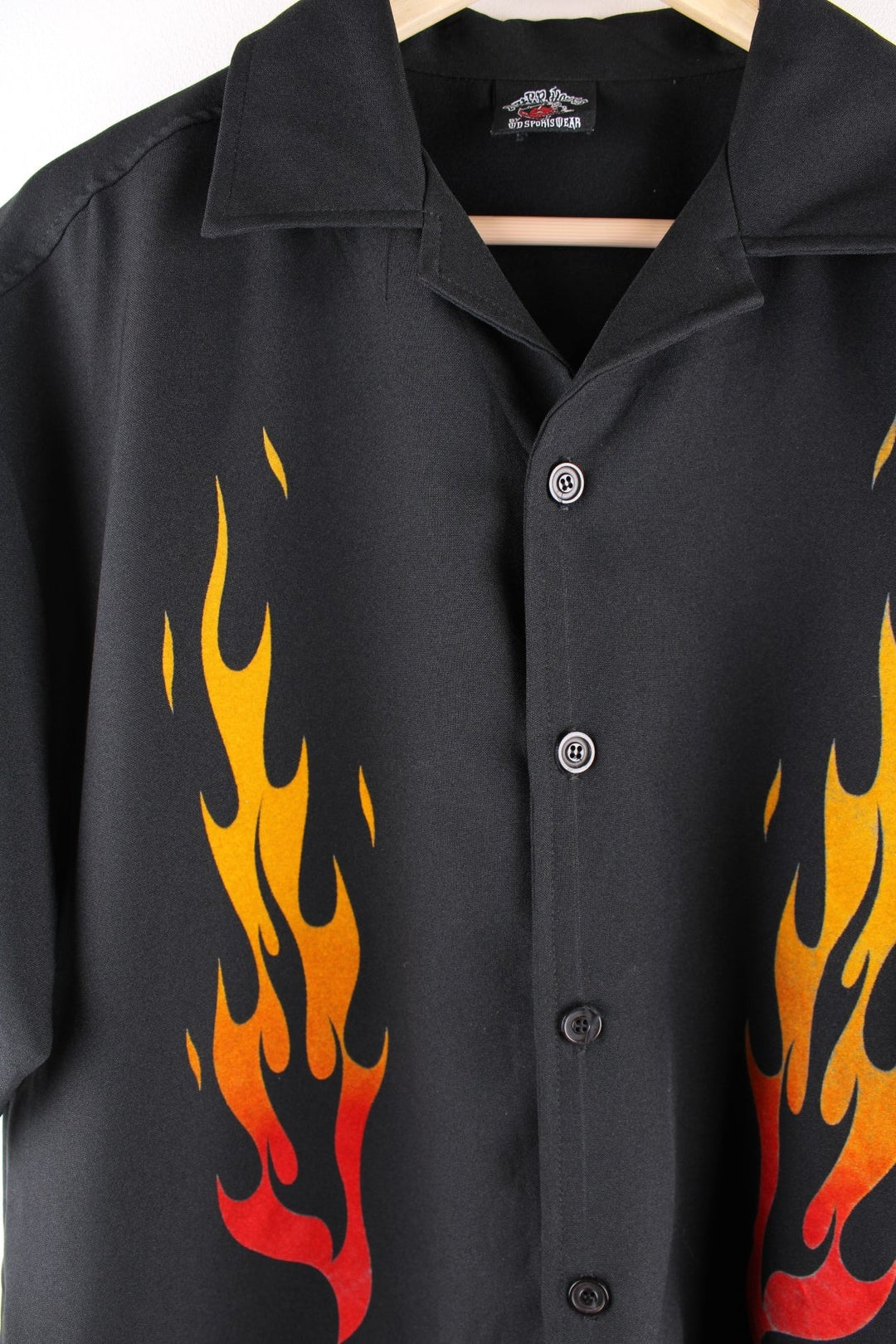 Y2K After Hours by WD Sportswear short-sleeved bowling shirt in black with orange flame design on the front.