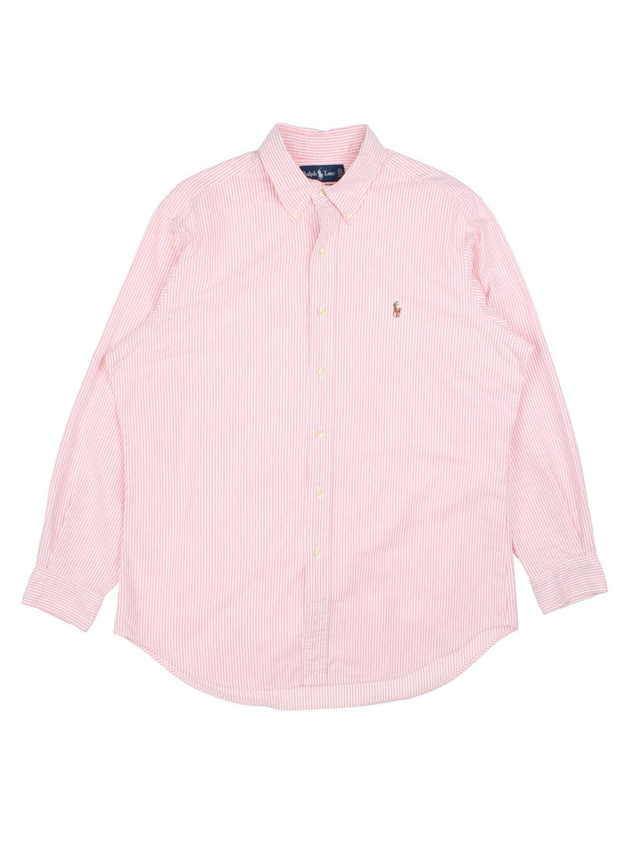 Ralph Lauren Shirt in a pink colourway, button up with the logo embroidered on the front.