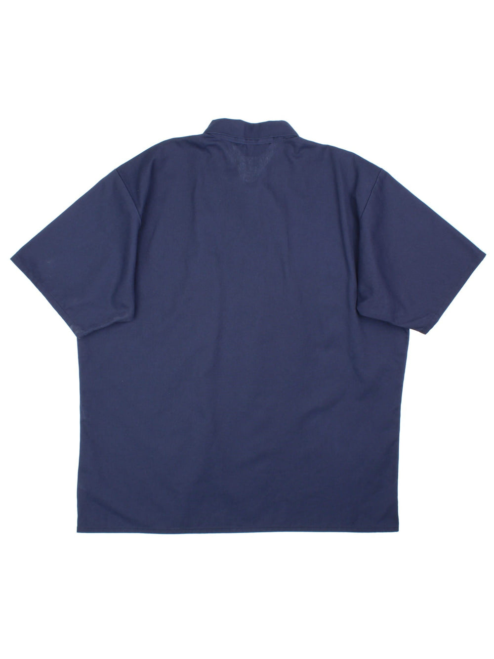 Ben Davis work shirt in a navy blue colourway. The shirt has the classic Ben Davis zip, and double breast pockets, with a pen pocket. Logo is stitched on the front. Made in the USA. 